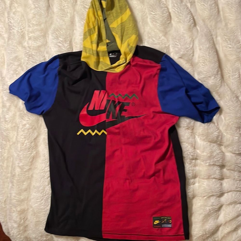Nike two multi color shirt with hood.